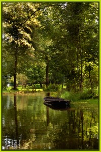 Tranquil canal boat - Theo Prucha